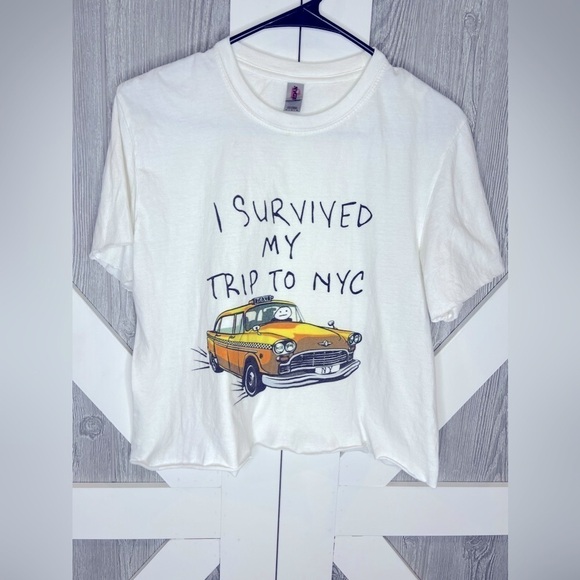 Tops - BAG159. “I Survived My Trip to NYC” cut off tee Medium